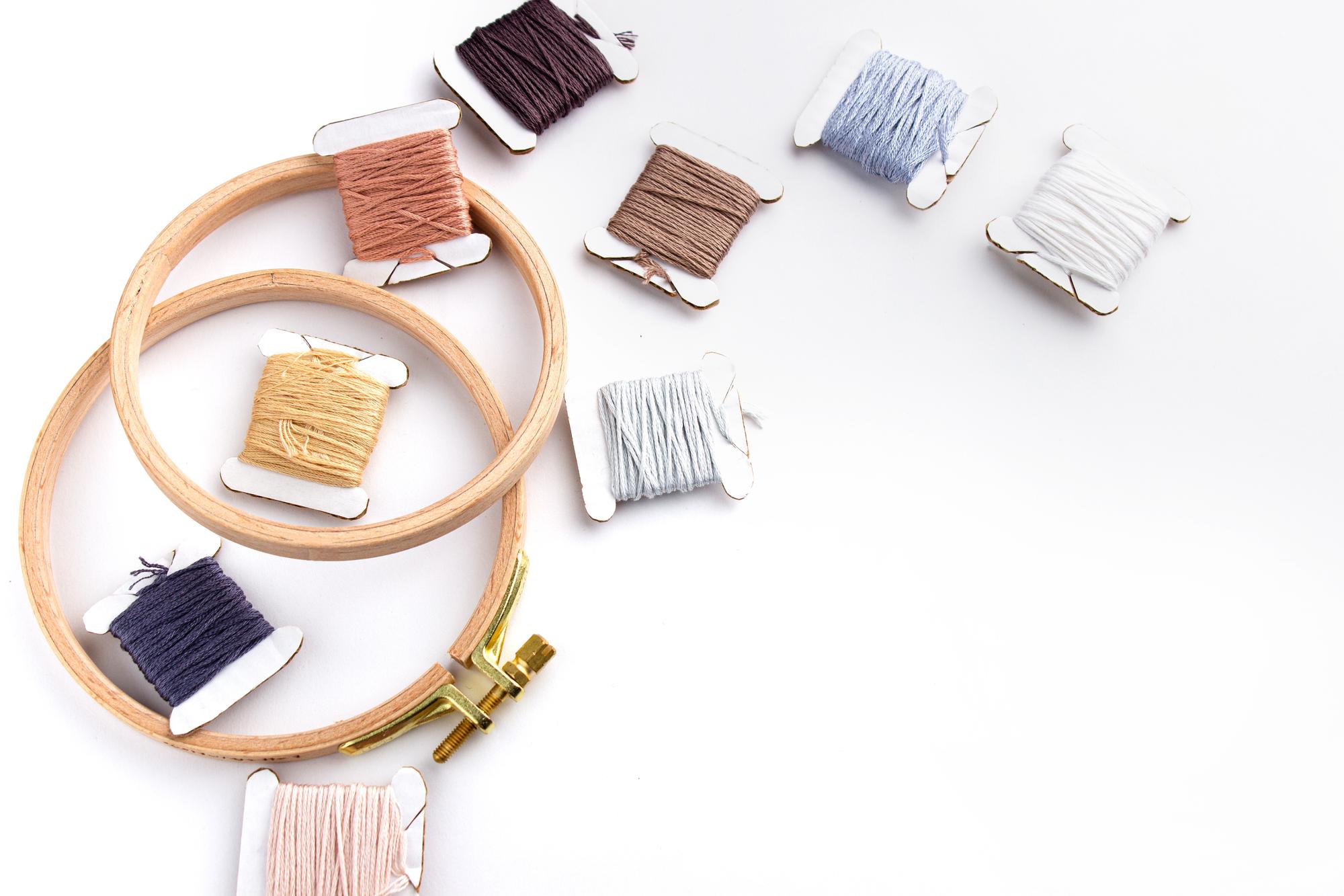 studio corner with threads and hoops