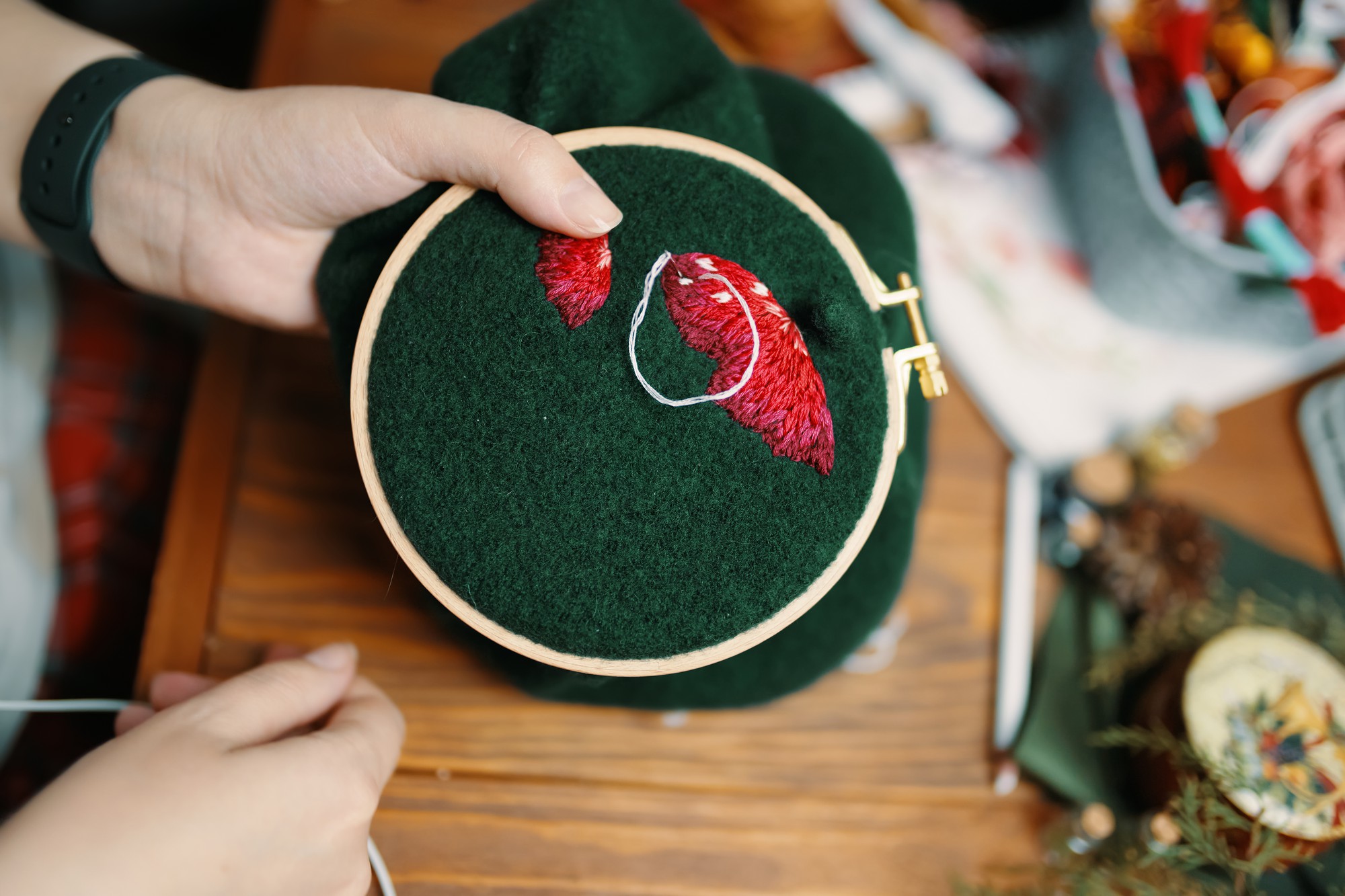 detail of premium embroidered hoop with floral motif