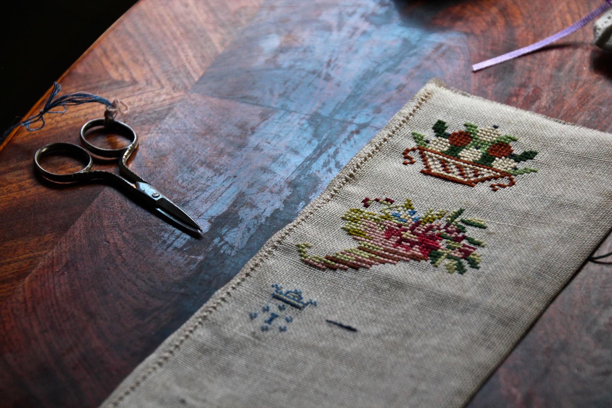 selection of embroidered samples in studio